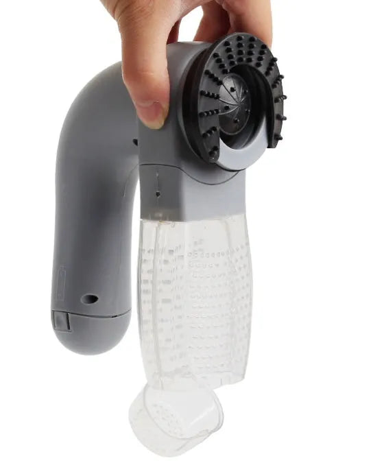 Grey portable pet hair removal vacuum brush with soft rubber head for grooming dogs and cats