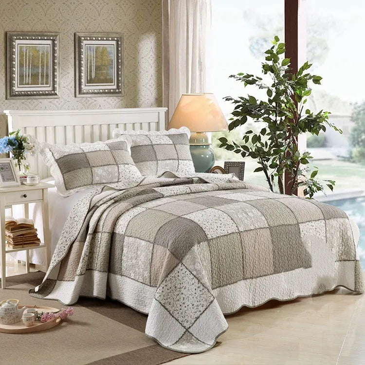 Pure cotton quilted bedspread three-piece set in a patterned colour with two matching pillowcases.