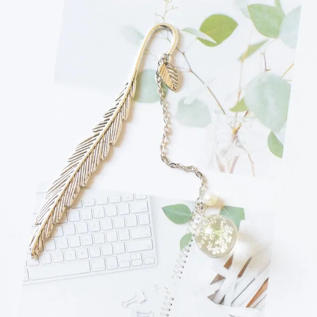 Dried flower specimen bookmark in alloy metal frame, 12cm length with botanical details