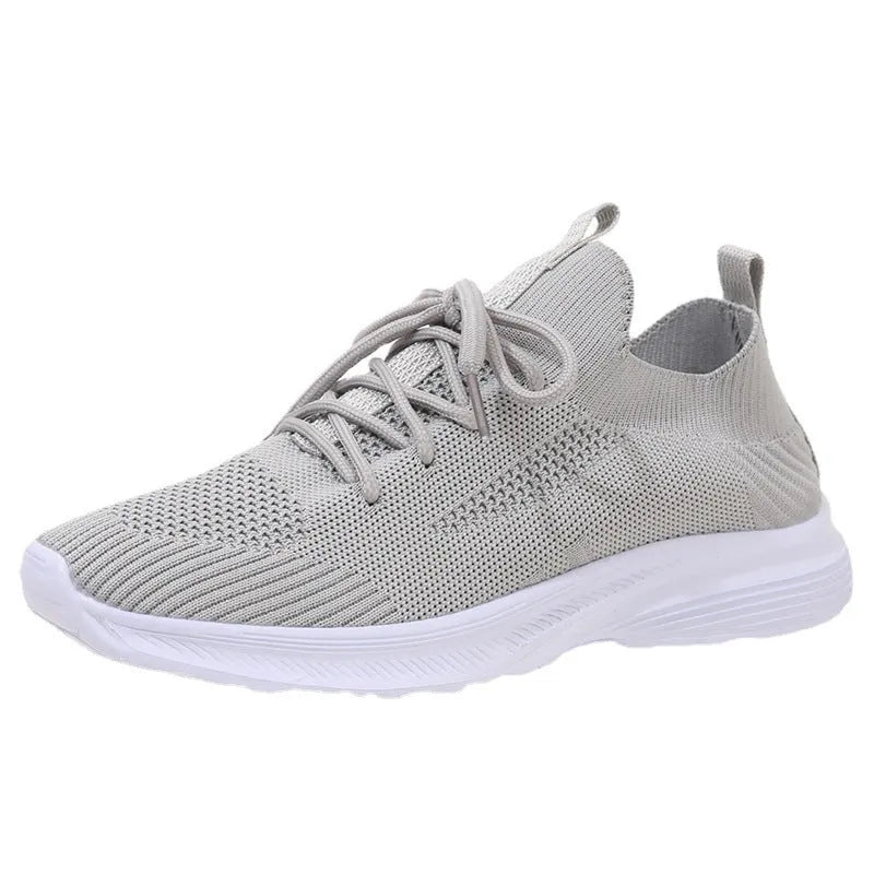 Women's mesh Flyknit running shoes, low top, flat heel, round toe, rubber sole, colour creamy white, side view