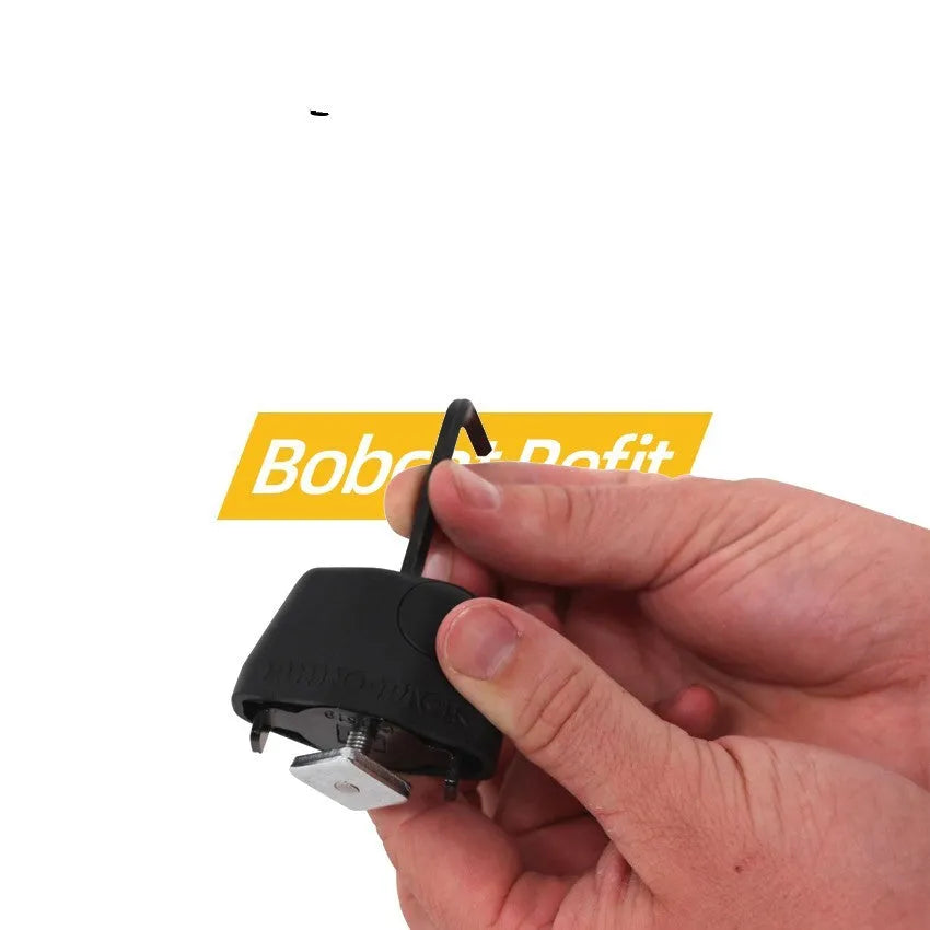 Roof platform steel cable lock with plastic sheath for securing camping kayaks and ladders.
