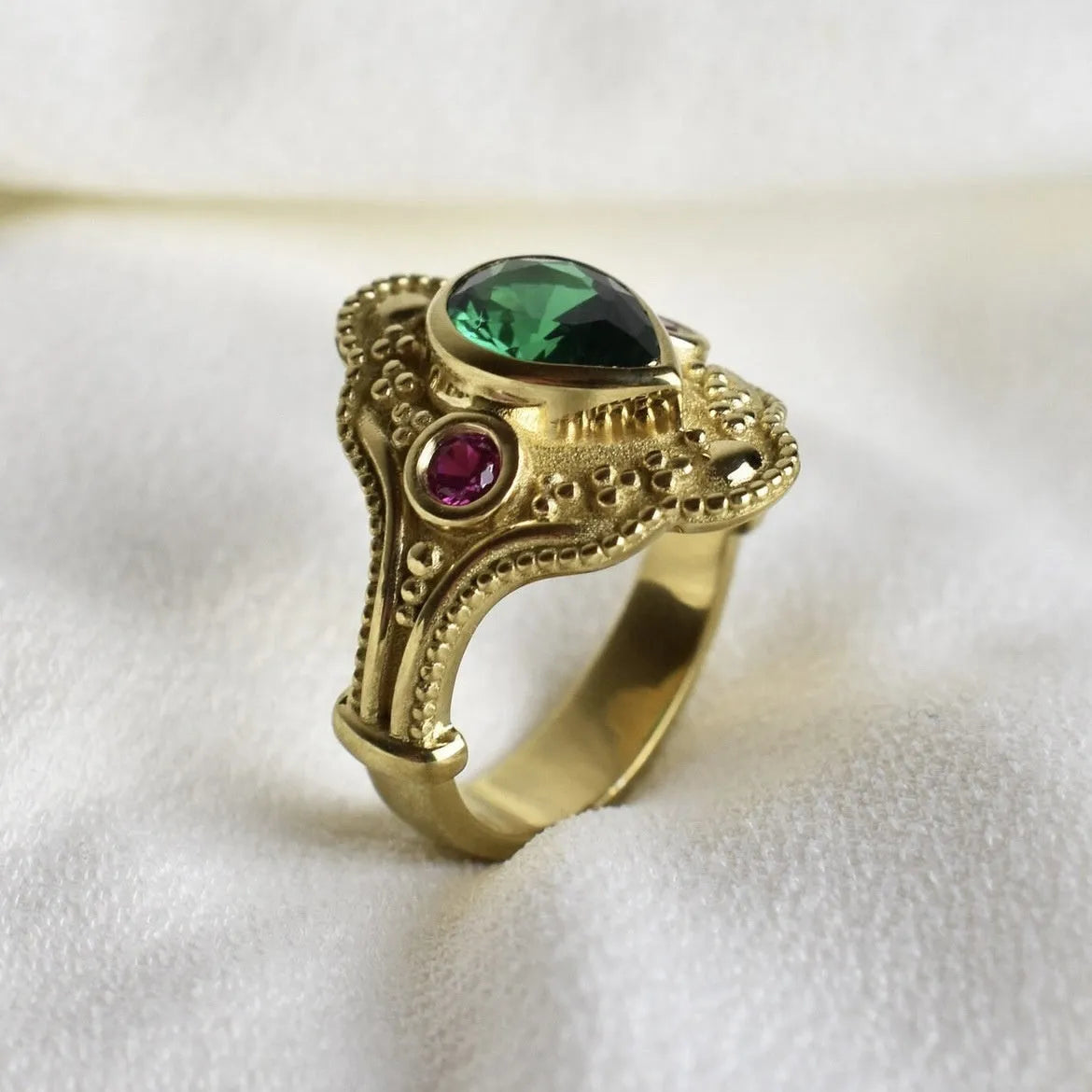 Gold-plated geometric women's fashion ring with ins style design on a plain background.