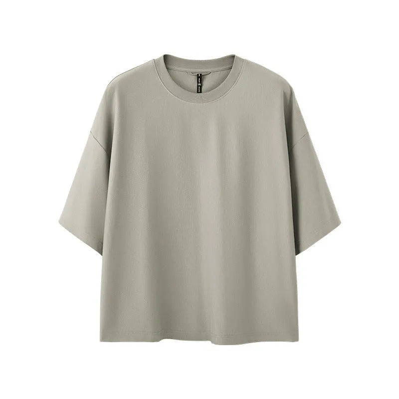 Men's sand grey short sleeve pullover showing loose fit and regular sleeve construction