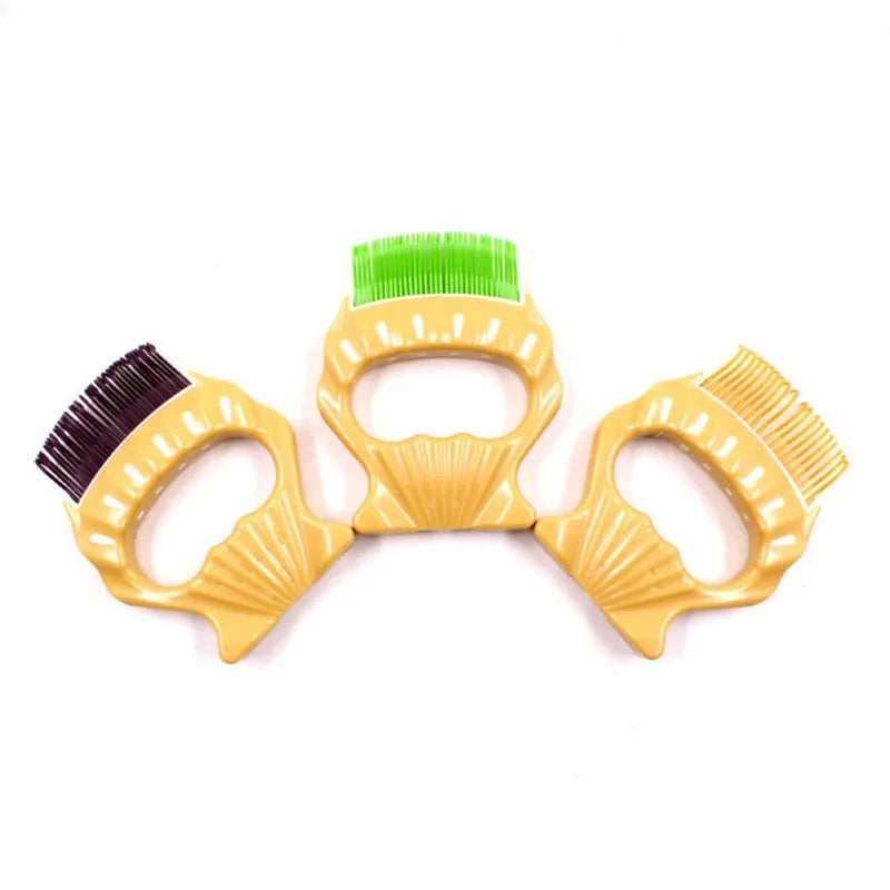 Shell shaped pet grooming brush in green, orange, or purple colours for dogs and cats
