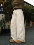 Men's pleated straight trousers with elastic waist in striped cotton-polyester fabric