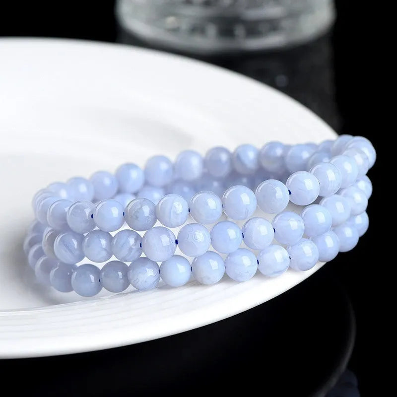 Blue agate bracelet with natural patterns, ruyi elements, and scattered bead arrangement