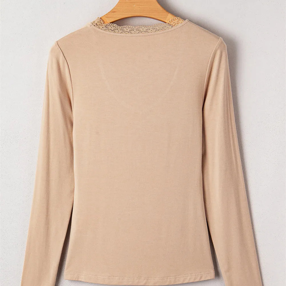 Women's solid colour casual top with lace trim on long sleeves in slim fit silhouette
