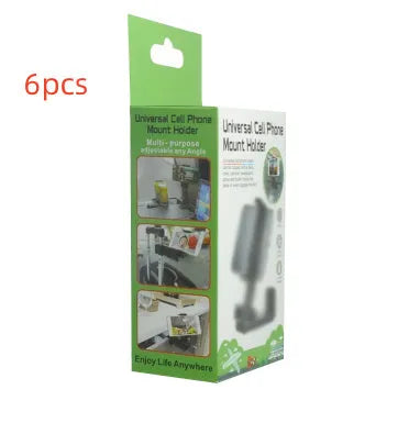 360 rotary collapsible mobile phone holder in black on a desk, with a phone propped up in landscape mode