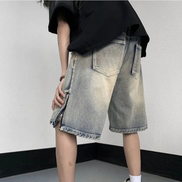Blue retro tattered denim shorts with wide-leg loose fit for women, side view