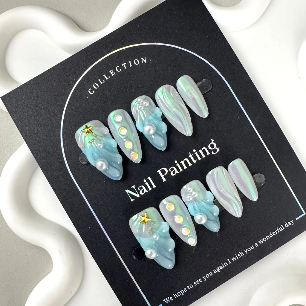 Blue plastic HAILANG false nail tips set showing sizes XS, S, M, L on a card.