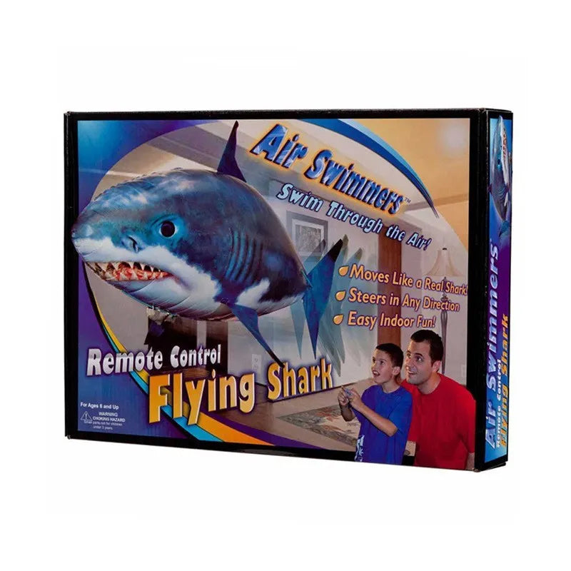 Large remote control shark inflatable balloon flying indoors with remote controller.