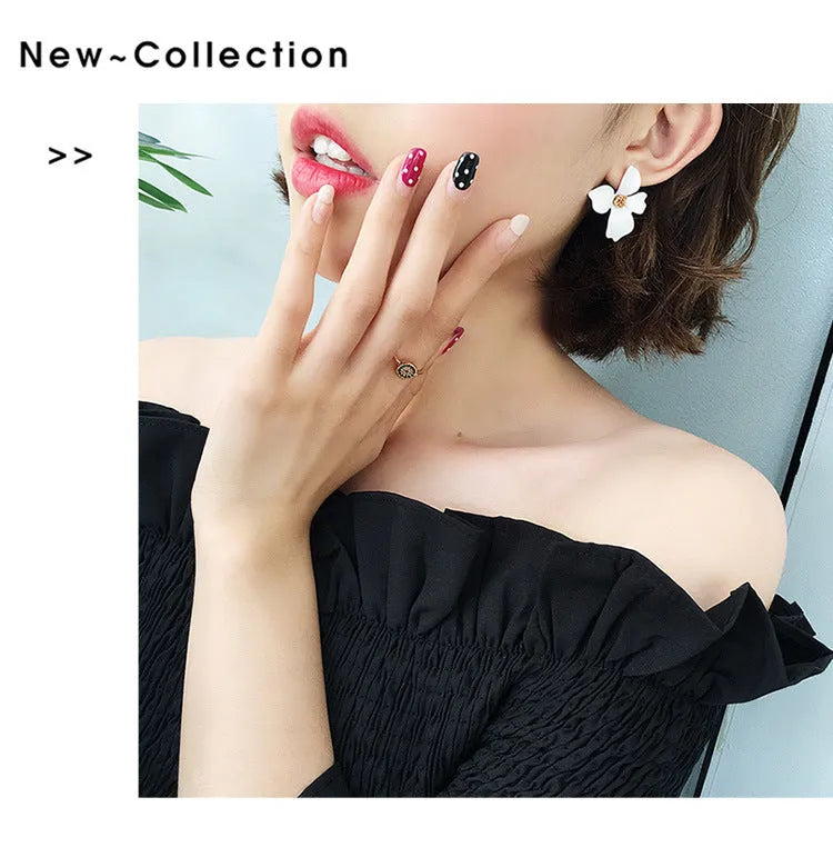 Flower-shaped stud earrings for women in pink or white colour with electroplated alloy construction