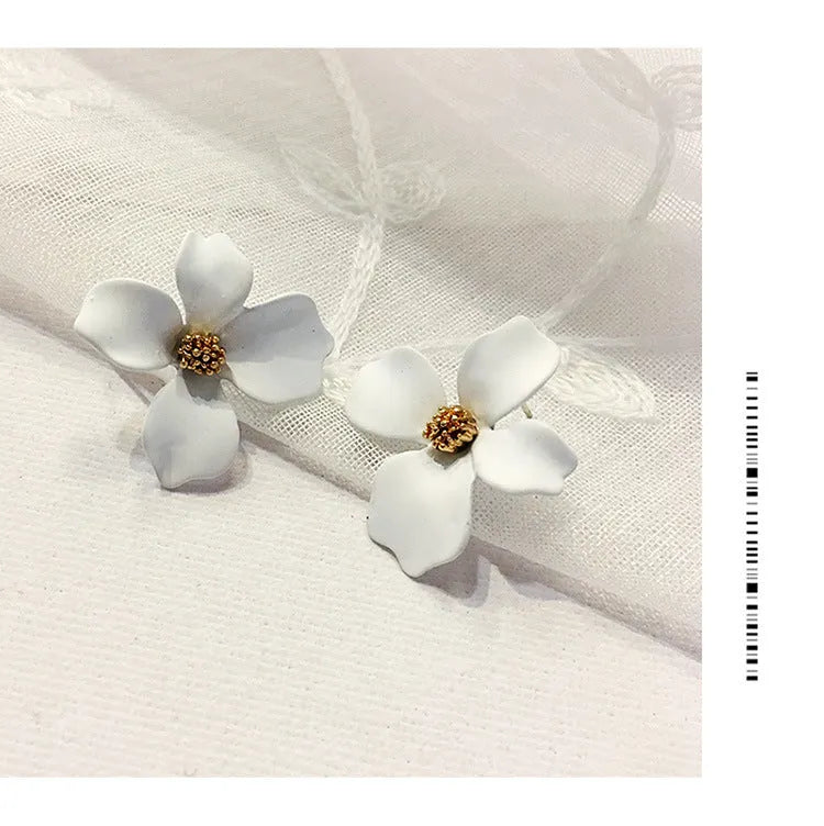 Flower-shaped stud earrings for women in pink or white colour with electroplated alloy construction