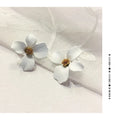 Flower-shaped stud earrings for women in pink or white colour with electroplated alloy construction