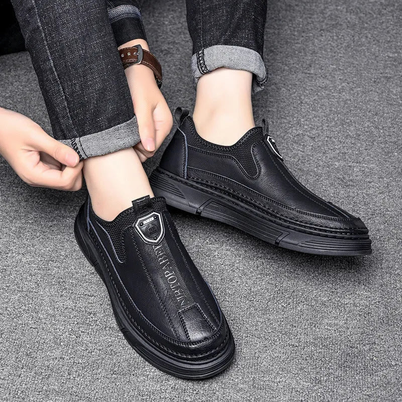 Men's casual leather shoes in solid black or brown with round toe design