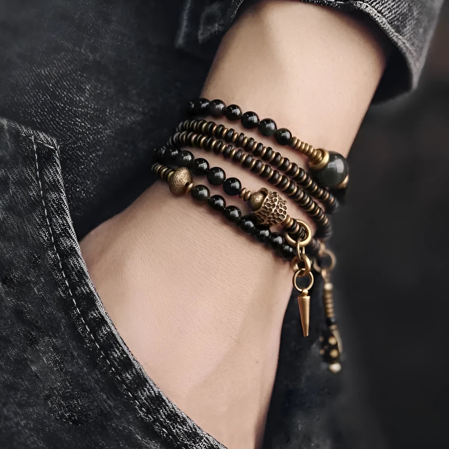Unisex black beaded geometry multi-layered bracelet with natural style on plain background