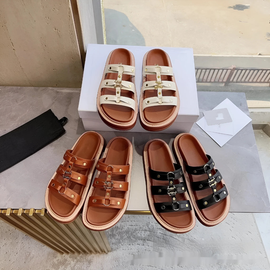 Women's Roman style sandal slippers in patent leather finish with sheepskin upper