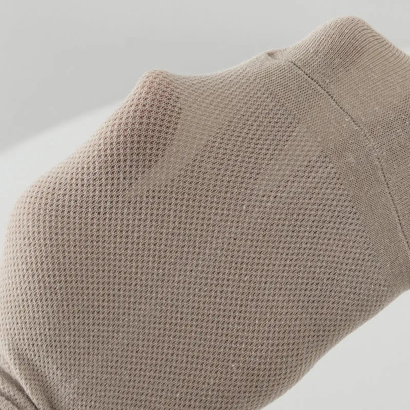 Men's solid colour low-cut polyester boat socks showing breathable fabric texture