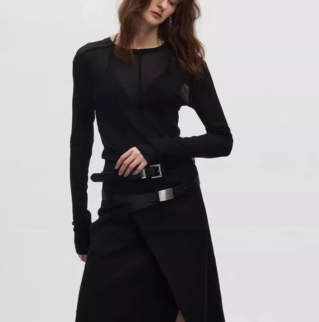 Black mesh see-through slim-fit long sleeve pullover top on a hanger
