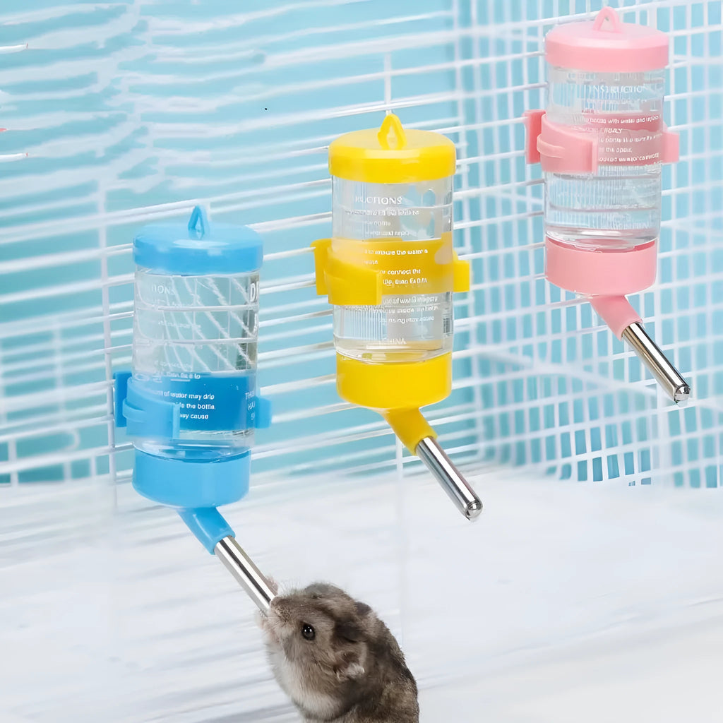 Plastic ball kettle pet water feeder in green colour with leak-proof valve for small animal cages.