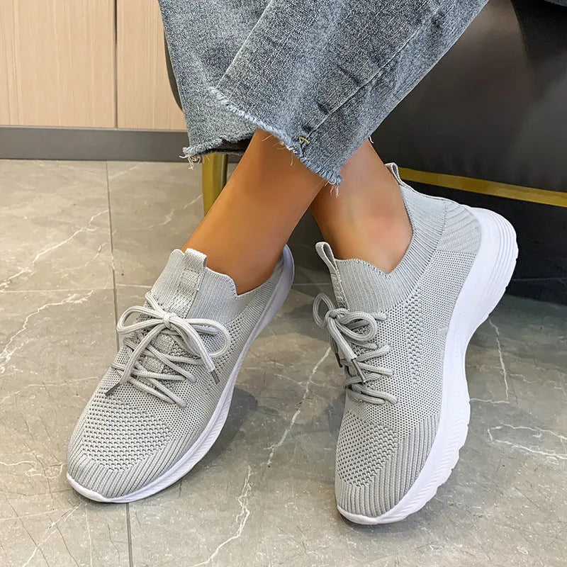 Women's mesh Flyknit running shoes, low top, flat heel, round toe, rubber sole, colour creamy white, side view