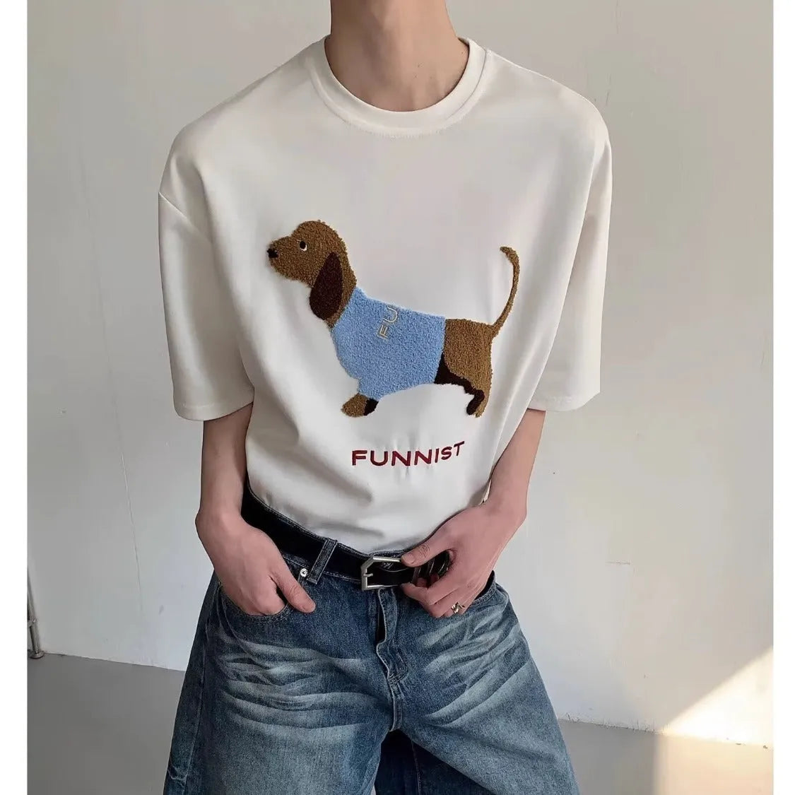 Men's grey cotton t-shirt with embroidered dachshund dog design on the front.