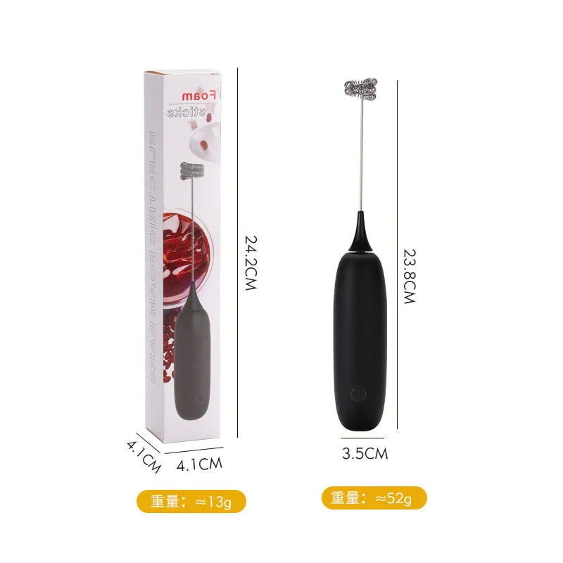 Black and white hand-held electric milk frother blender for coffee beverages