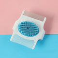 Blue and green multifunctional pet comb for dog grooming, showing compact 8.5cm size.