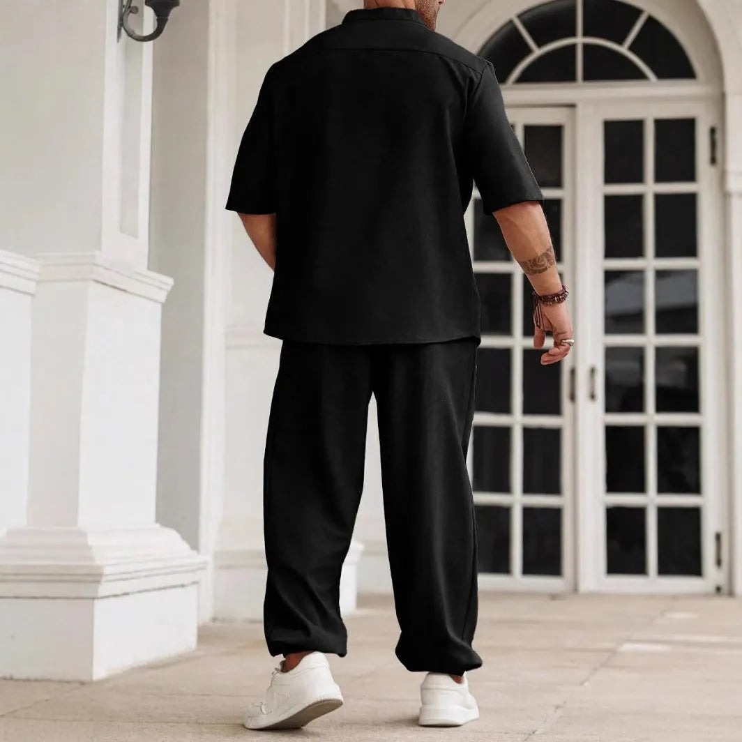 Men's apricot coloured cotton linen short sleeve shirt and trouser casual set laid flat.