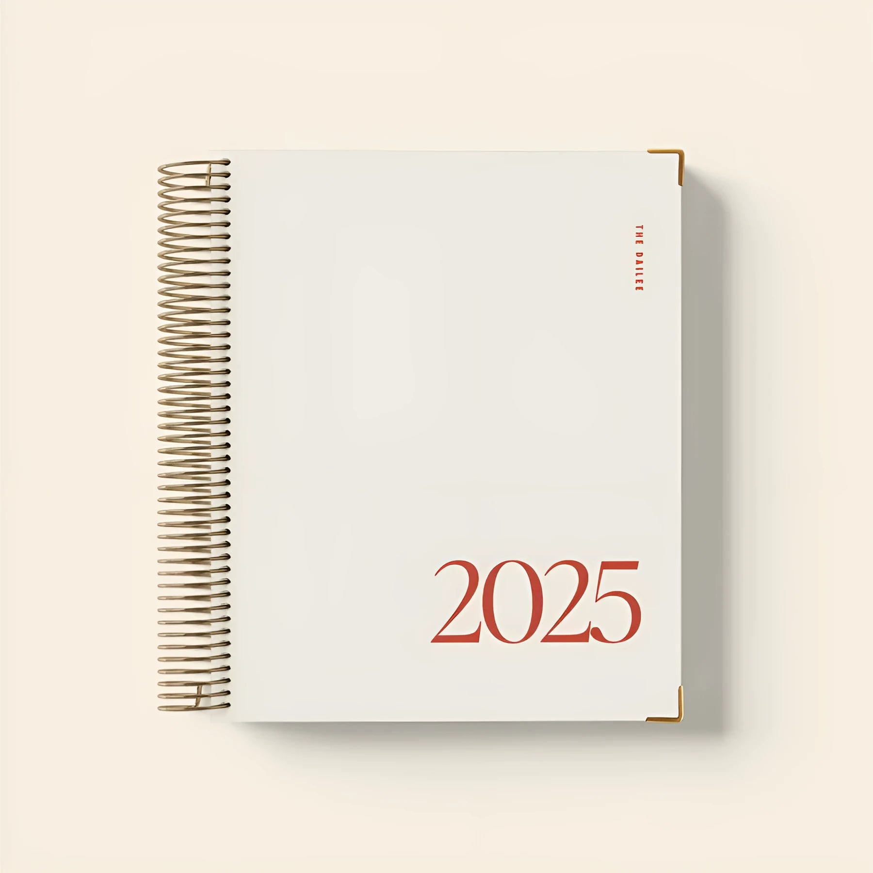 Cherry red A5 coil notebook with wire-bound spine for daily scheduling