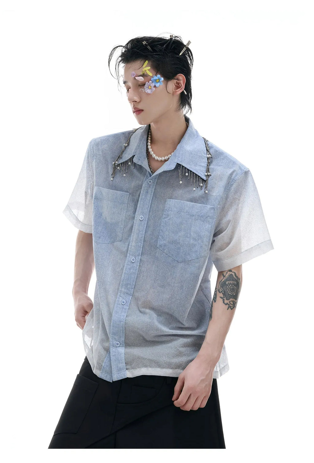 Men's loose blue and white gradient short sleeve shirt with quilted detailing.