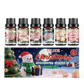 Christmas aromatherapy oil set showing six bottles in three festive scents with different sizes