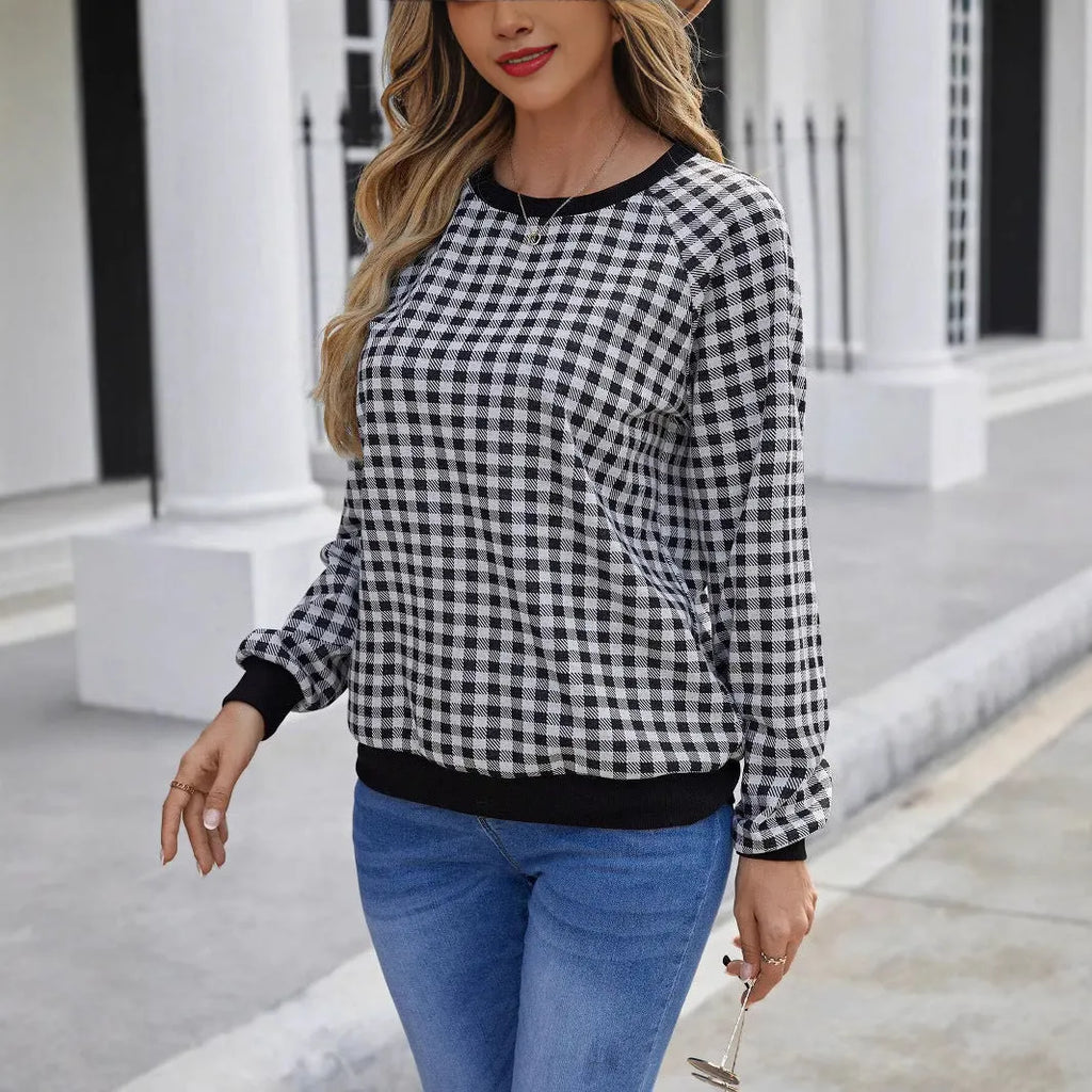Black polyester pullover sweater with printed plaid pattern and long sleeves