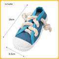 Plastic dog chew toy shaped like a slipper in yellow, black, and blue colour options.