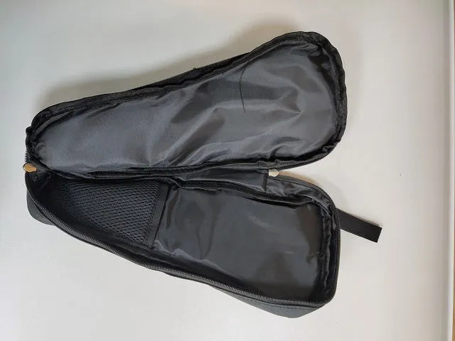 Black cloth storage bag for a mobile phone stabiliser and camera accessories.