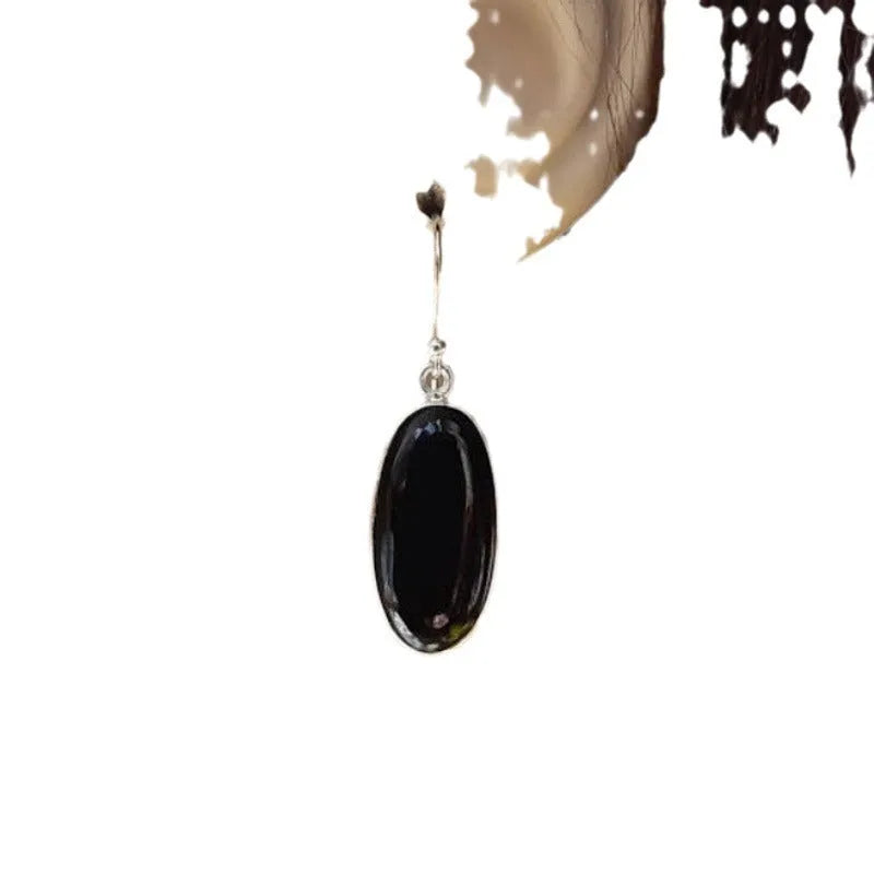 Women's geometric earrings with oval black agate pendants on silver-coloured alloy
