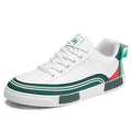 Men's beige and white and green canvas casual shoes with mesh sections and a round toe.