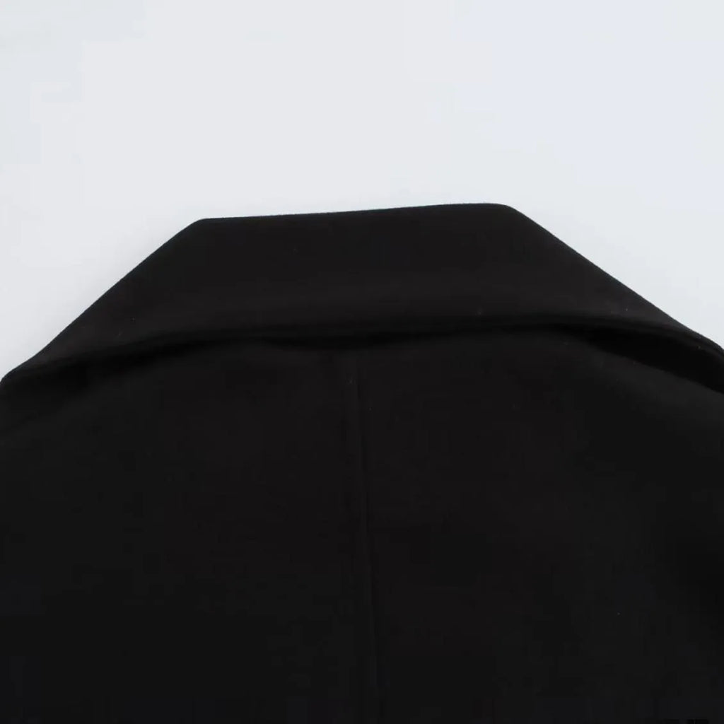 Women's long camel coat with a detachable artificial fur collar in a street fashion style.