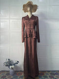 Dark brown retro floral long sleeve dress with button detailing and artistic design