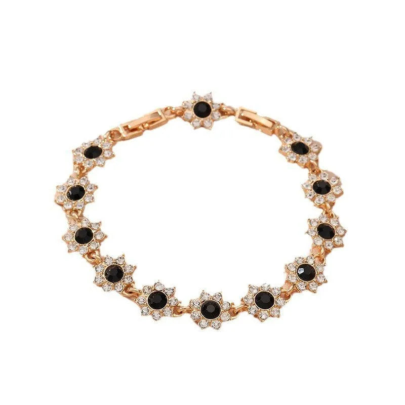 Flower-shaped electroplated bracelet in zinc alloy with colourful crystal accents