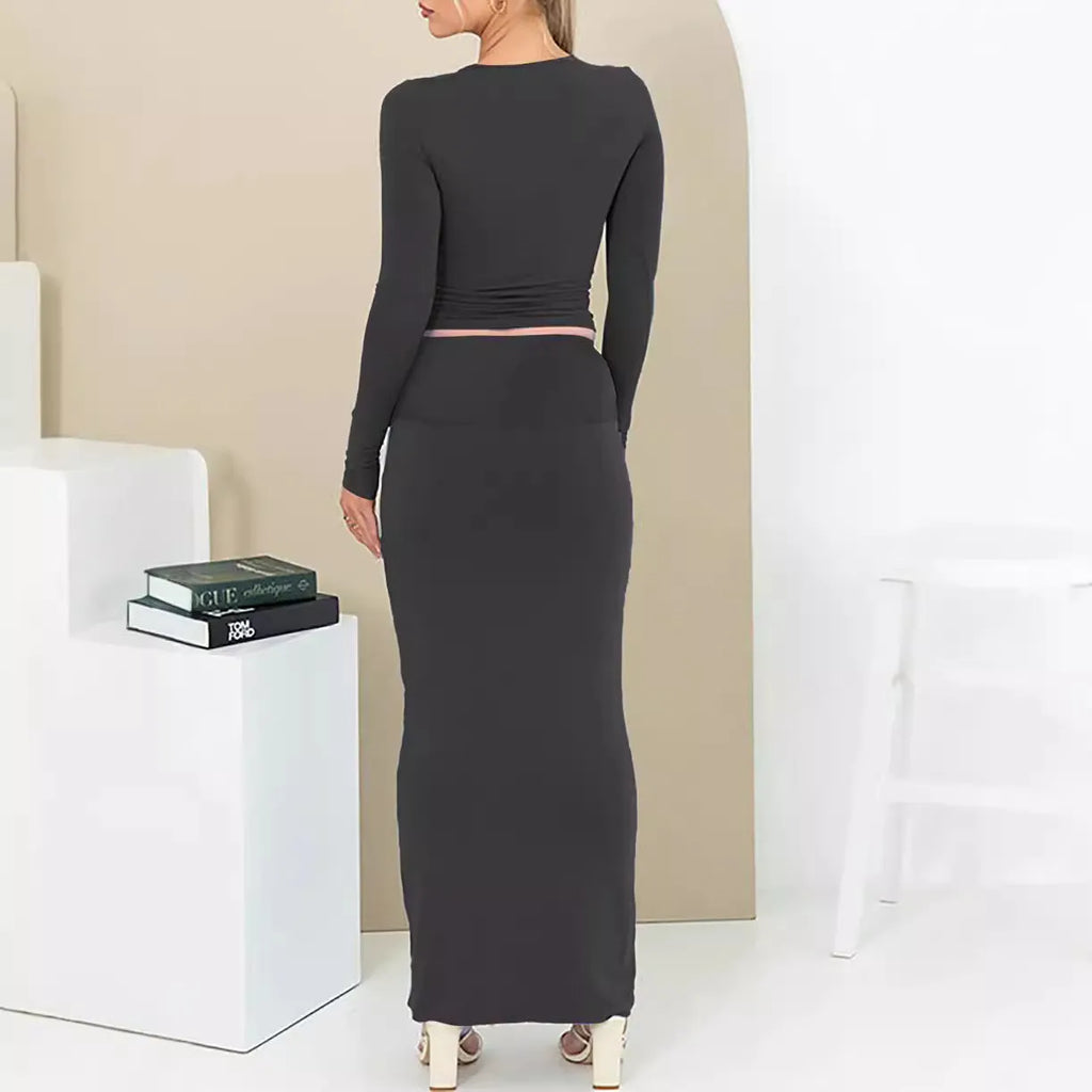 Women's autumn two-piece suit set showing top with three-quarter sleeves and matching long skirt