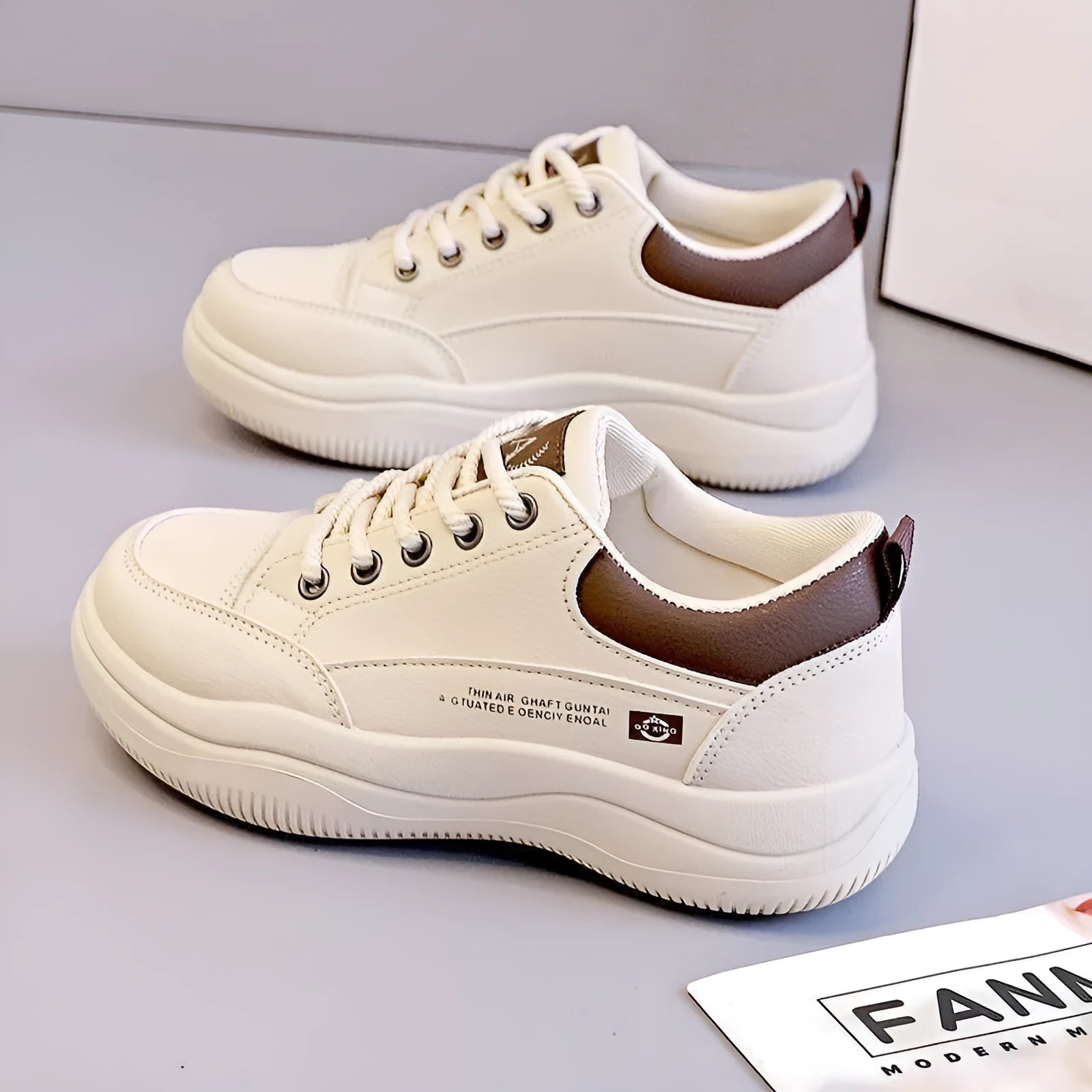 Women's white Korean style pumps with cross straps and lace-up design showing round toe and mid heel