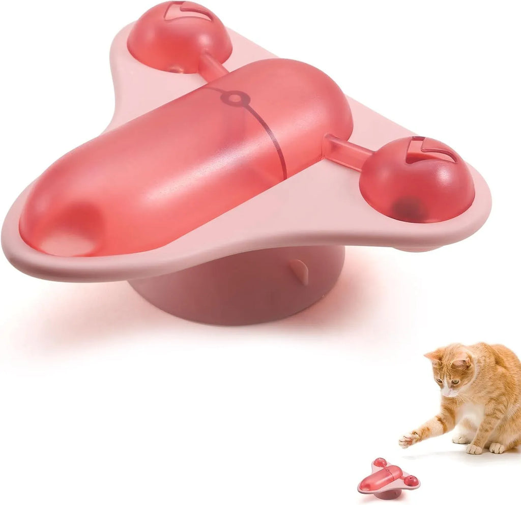 Blue interactive pet puzzle feeder toy with bell, catnip and snack cabin on a floor.