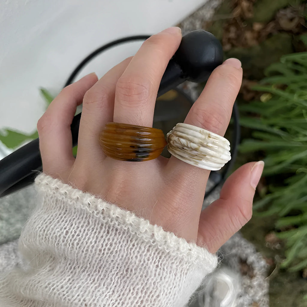 Geometric irregular resin wide ring in Maillard Brown, Smoky Brown, and Latte White colours