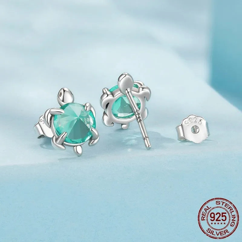 S925 sterling silver turtle ear studs and ring set on white background, electroplated 925 silver jewellery for women