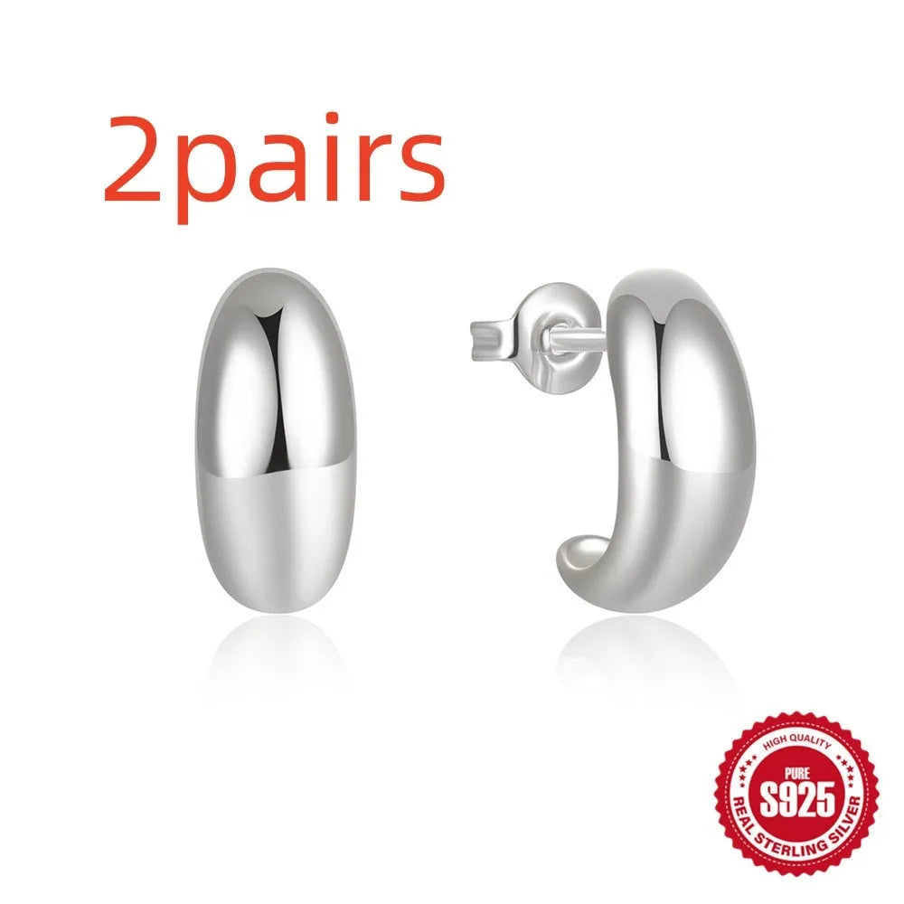 C-shaped sterling silver stud earrings with electroplated gold finish geometric jewellery