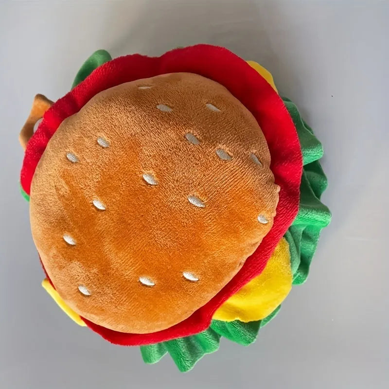 Brown, green, and beige burger-themed fabric headdress for cats on a white background.