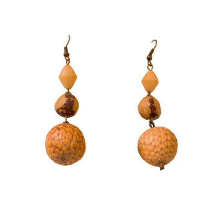 Retro ethnic style brown resin fruit core tassel earrings with geometric round design for women.