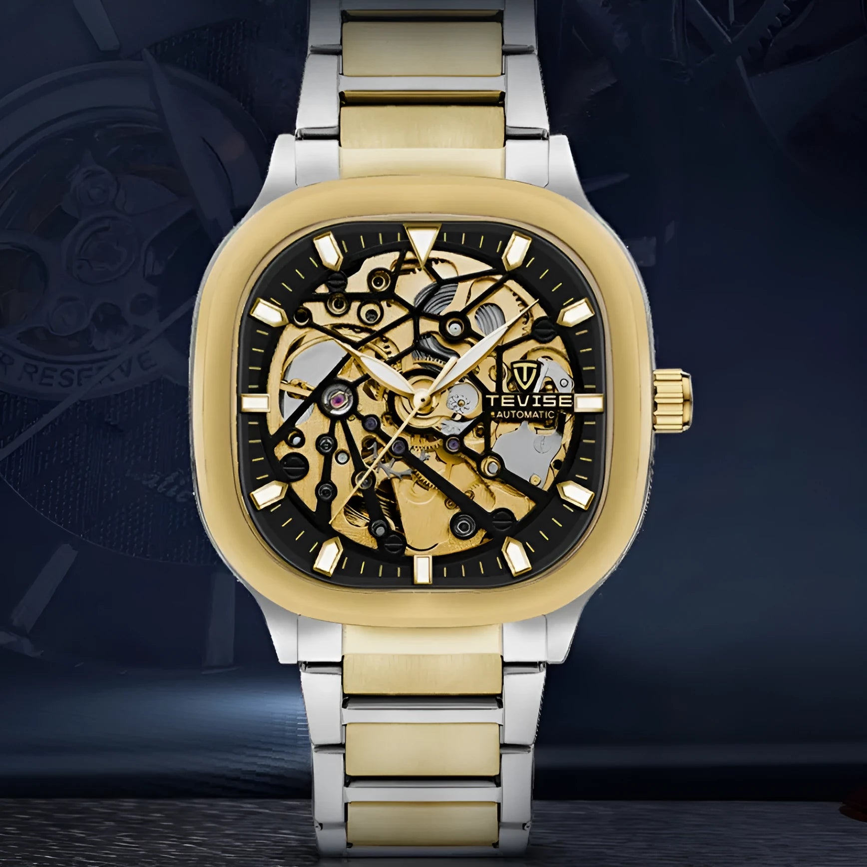 Men's square automatic watch with luminous hollow case and stainless steel strap on wrist.