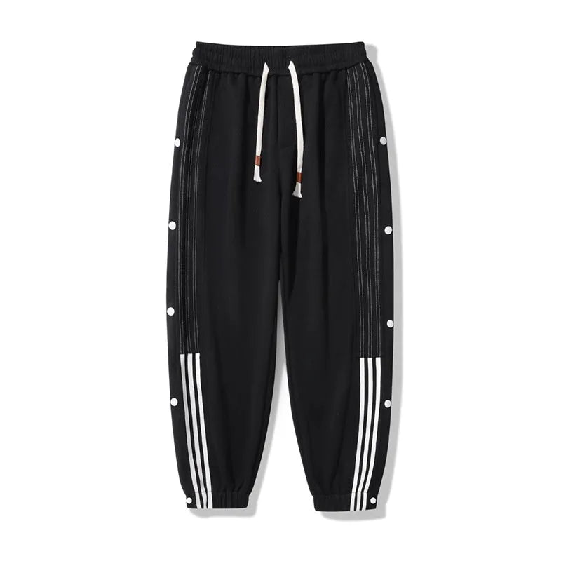 Men's loose cotton blend sweatpants with ankle-tied cuffs in black colour